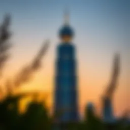 Stunning view of Al Ameer Tower against a sunset backdrop