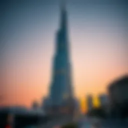 Stunning view of Al Shatha Tower against a sunset sky