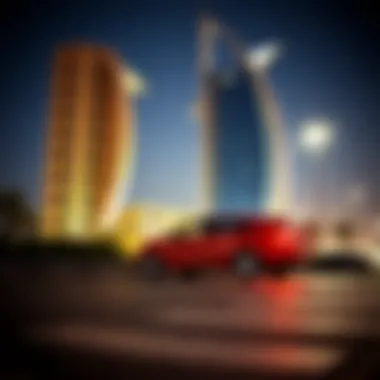 Car parked in front of a Dubai landmark