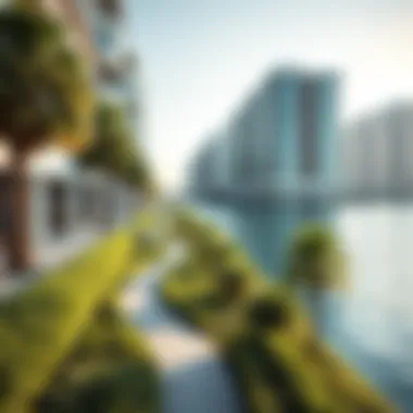 A picturesque waterfront view in Business Bay, featuring lush greenery and walking paths