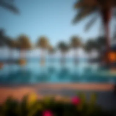 Luxurious infinity pool at The Address Jumeirah Resort and Spa surrounded by palm trees.