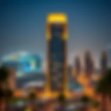 Night view of Waqf Al Qasimia University Tower illuminated against the Dubai skyline