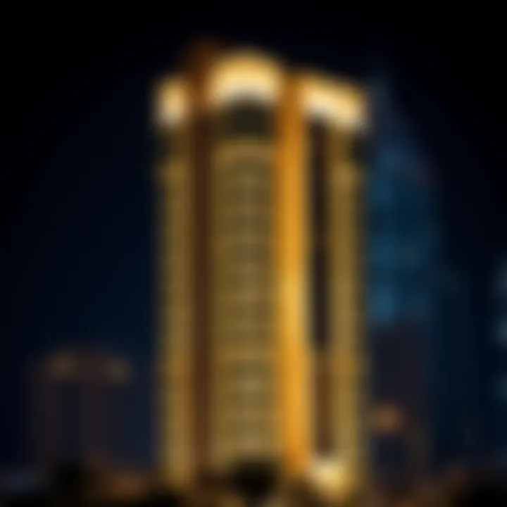 The Al Yousuf Building illuminated at night against the Dubai skyline